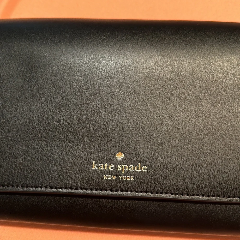 New Kate Spade leather handbag. Black. Dust Bag Included.